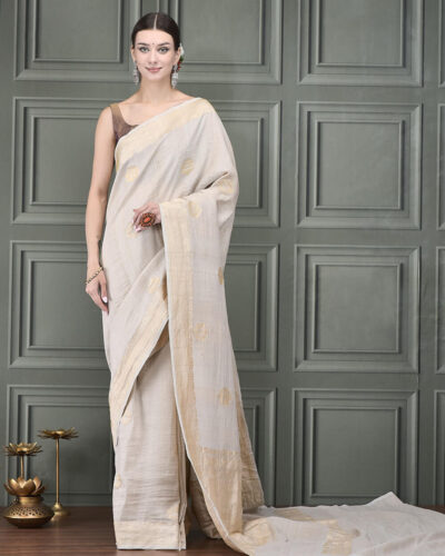 A refined Banarasi handloom saree in rich Tussar silk, featuring elegant Alfiboota motifs and a finely woven Kadhwa border for timeless appeal