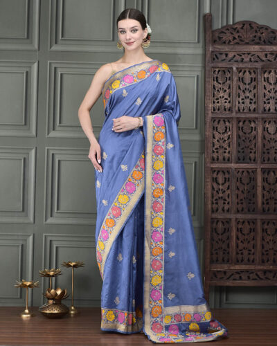 A classic Banarasi handloom silk saree with finely woven Kadhwa booti motifs, rich in heritage and elegance